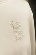 Mao mao | Les Carnets de L'apothicaire | Sweatshirt à capuche brodé