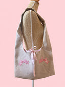 Sac cousu main brodé | Noeuds roses