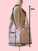 Sac cousu main brodé | Noeuds roses
